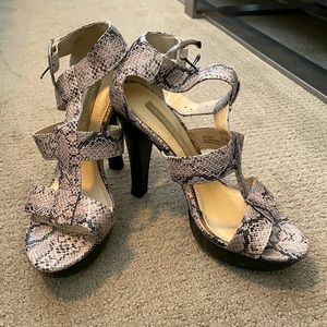Women’s tan and brown snake print heels